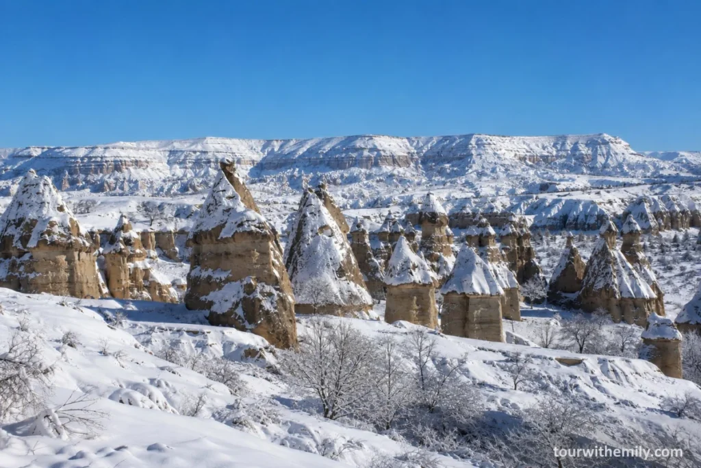 Snow covered fairy chimneys in Cappadocia in winter